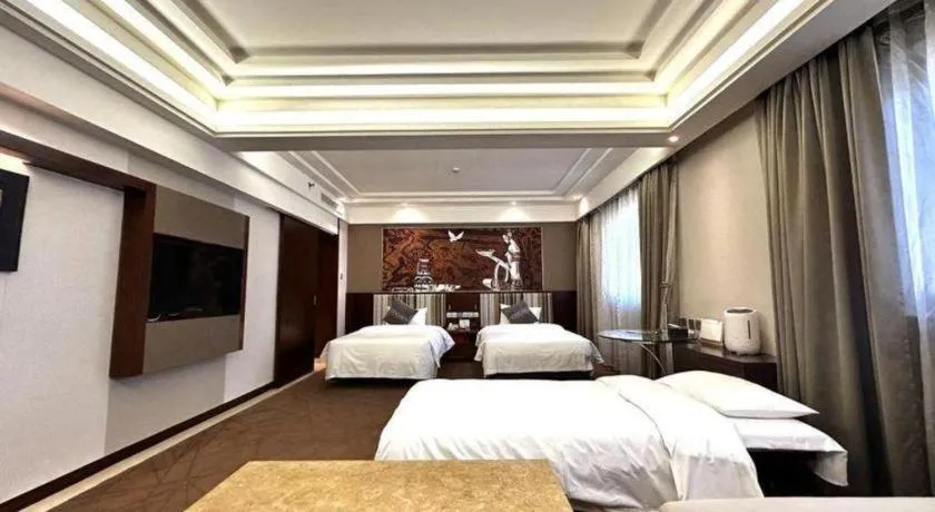 Bed in Grand Skylight Catic Hotel