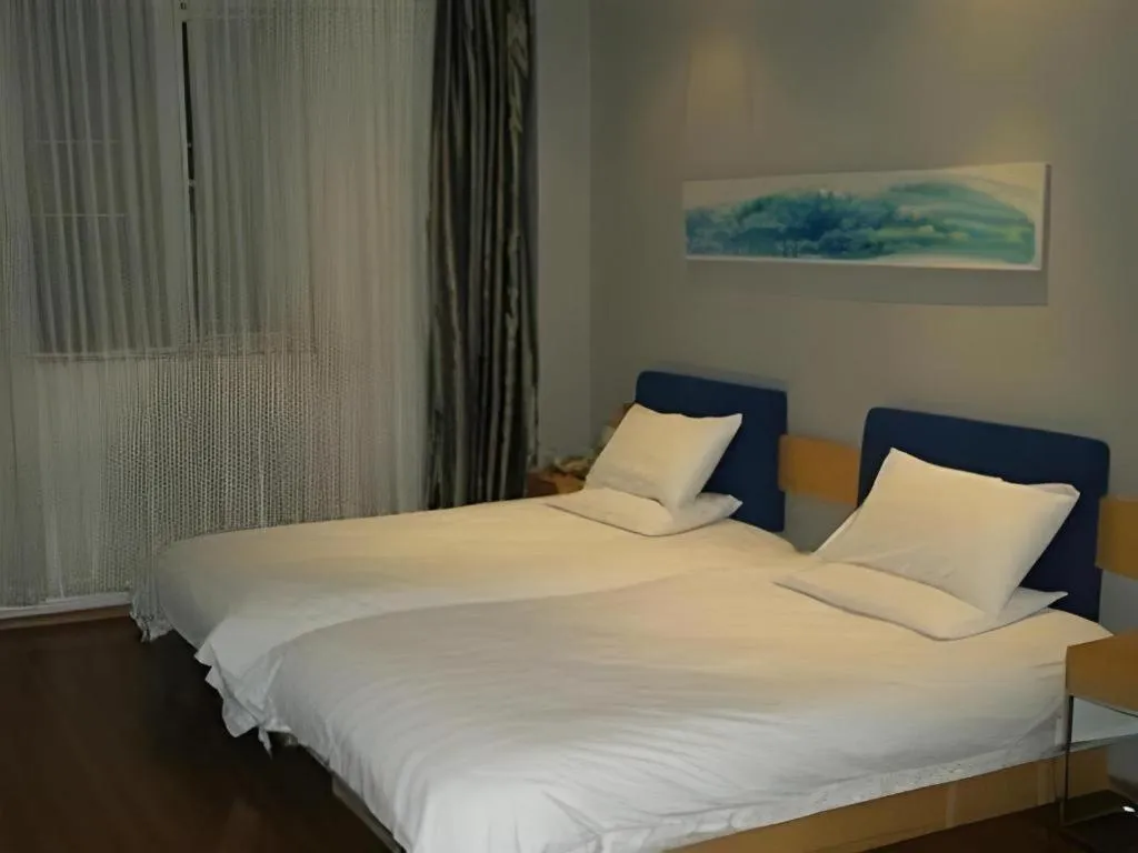 Bed in Jinjiang Inn Shaoxing Shengli West Road Luxun Hometown