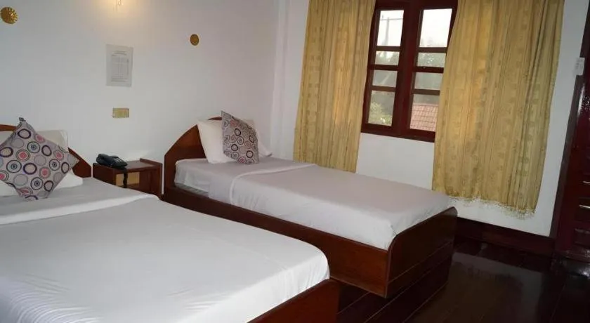 Bed in Champa Residence Hotel