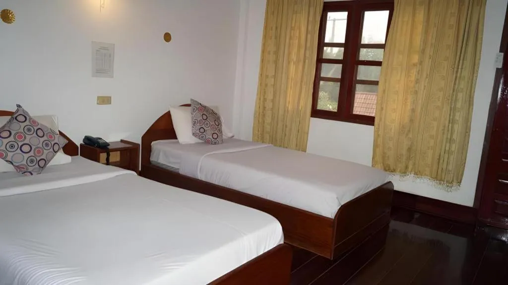 Bed in Champa Residence Hotel