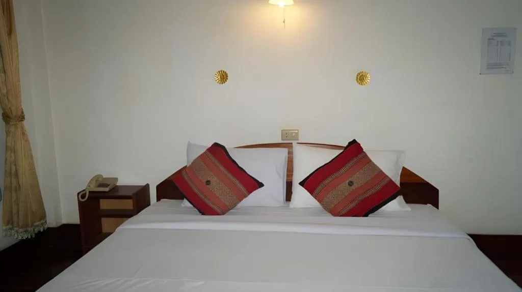 Bed in Champa Residence Hotel