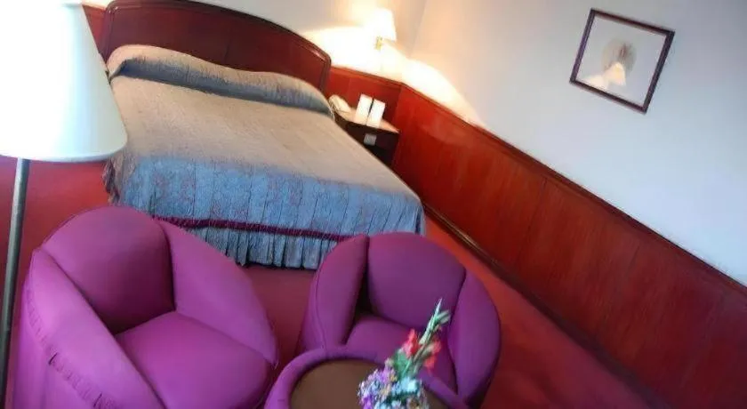 Bed in Great Eastern Hotel Quezon City