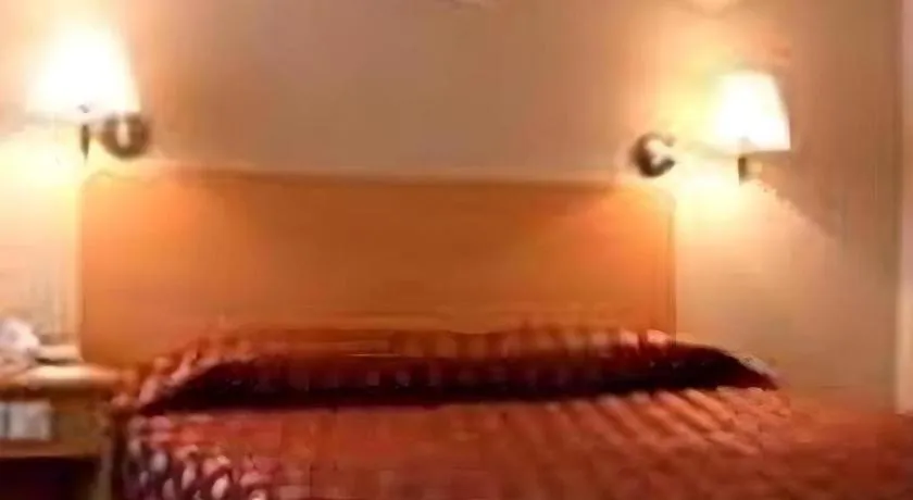 Bed in Great Eastern Hotel Quezon City