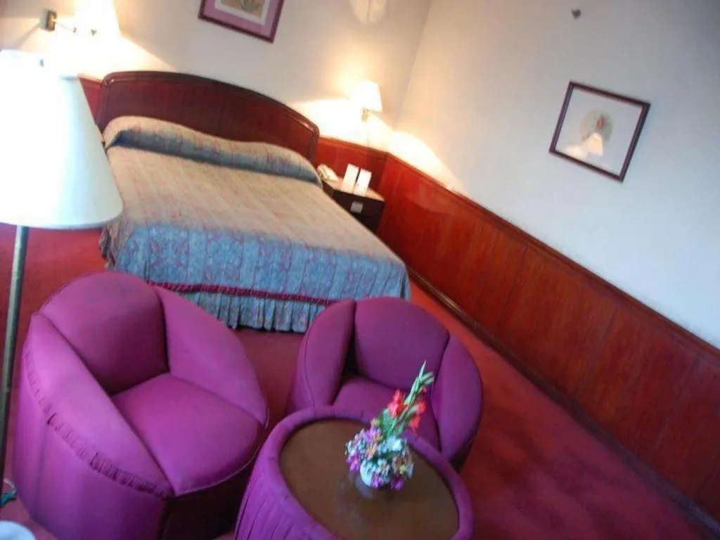 Bed in Great Eastern Hotel Quezon City