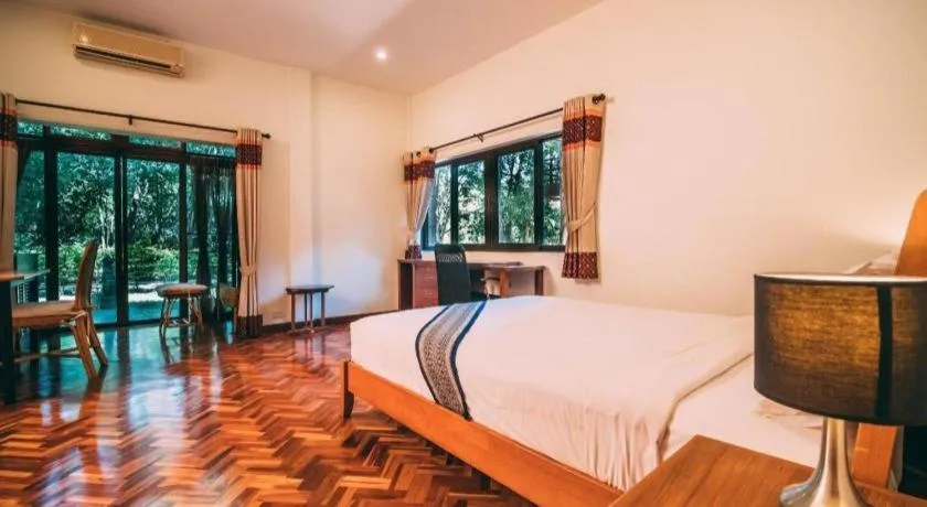 Bed in Tao Garden Health Spa & Resort