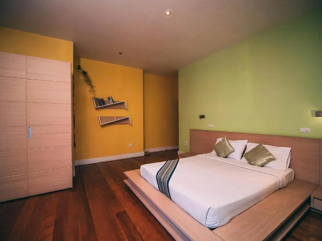 Bed in Tao Garden Health Spa & Resort