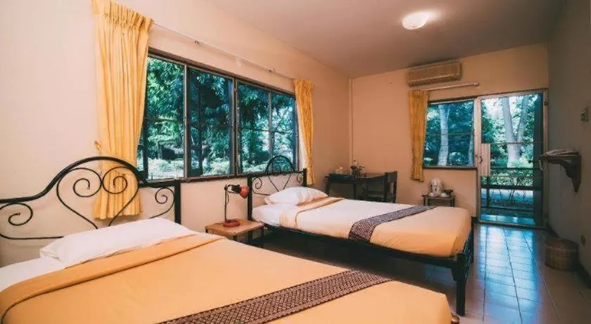 Bed in Tao Garden Health Spa & Resort