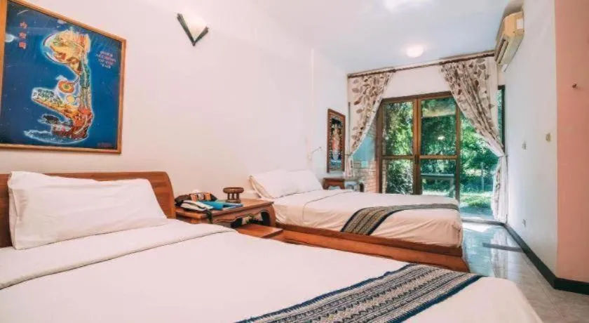 Bed in Tao Garden Health Spa & Resort