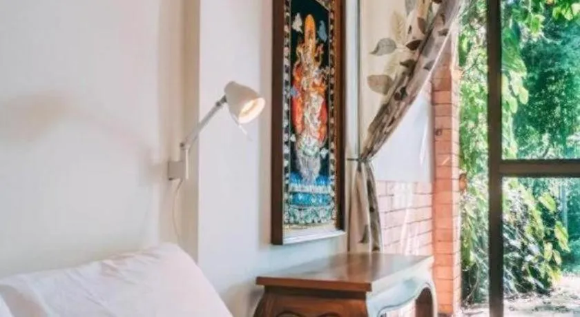 Bed in Tao Garden Health Spa & Resort