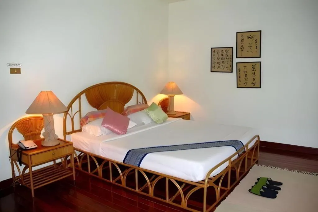 Bed in Tao Garden Health Spa & Resort