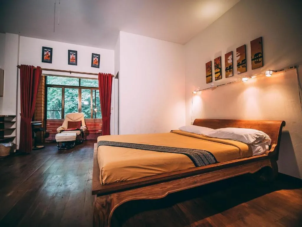 Bed in Tao Garden Health Spa & Resort