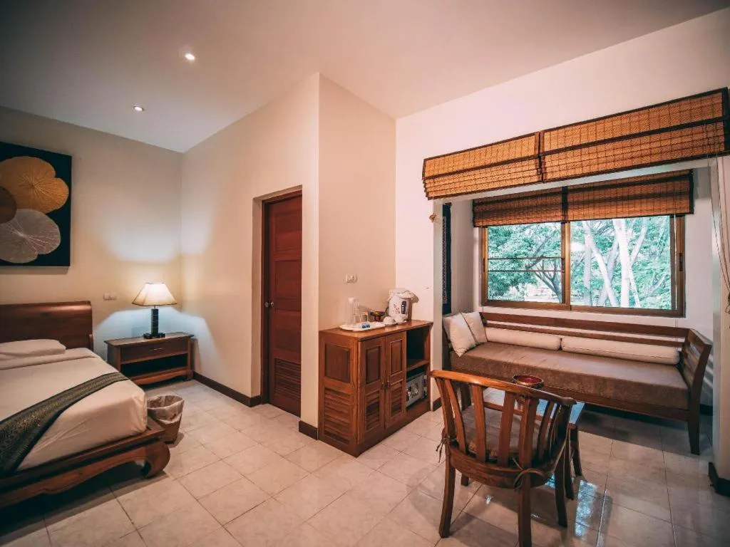 Bed in Tao Garden Health Spa & Resort