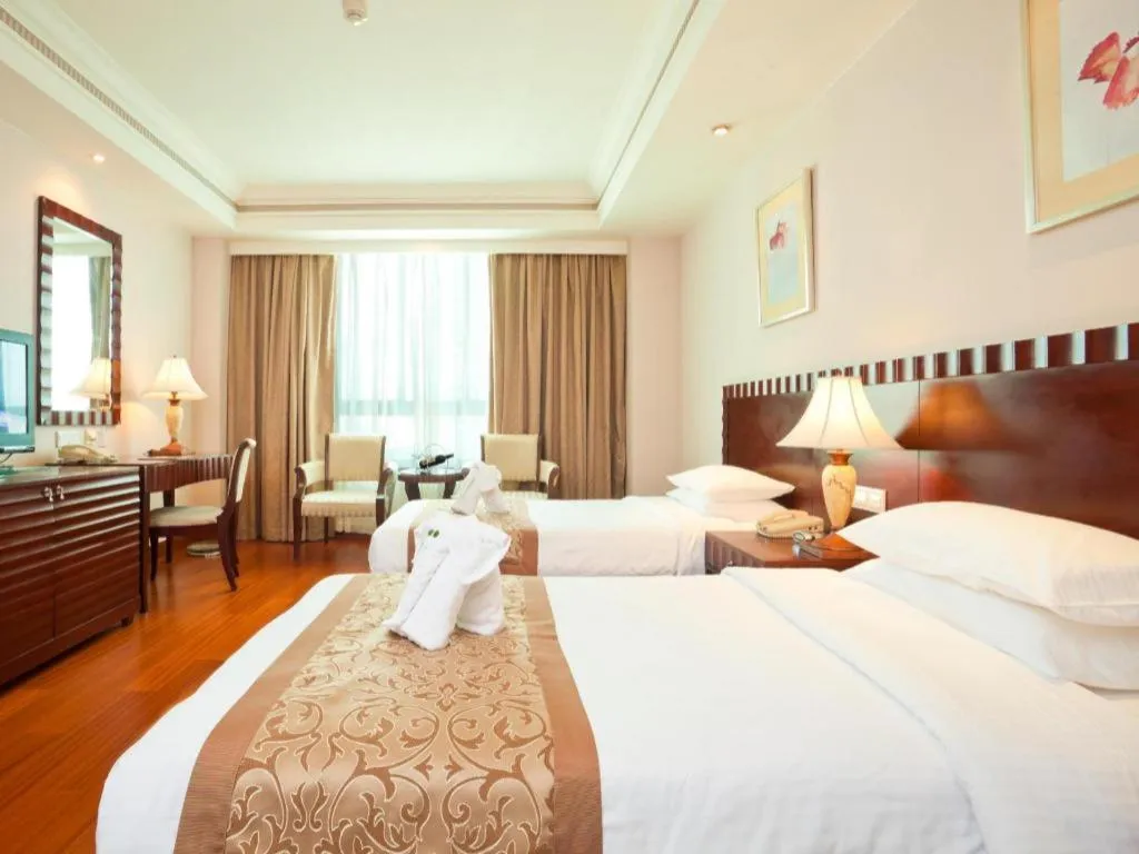 Bed in Sanya Baohong Hotel