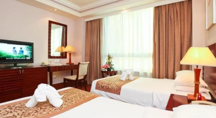 Bed in Sanya Baohong Hotel