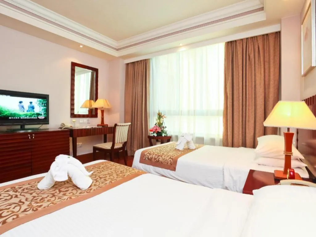 Bed in Sanya Baohong Hotel