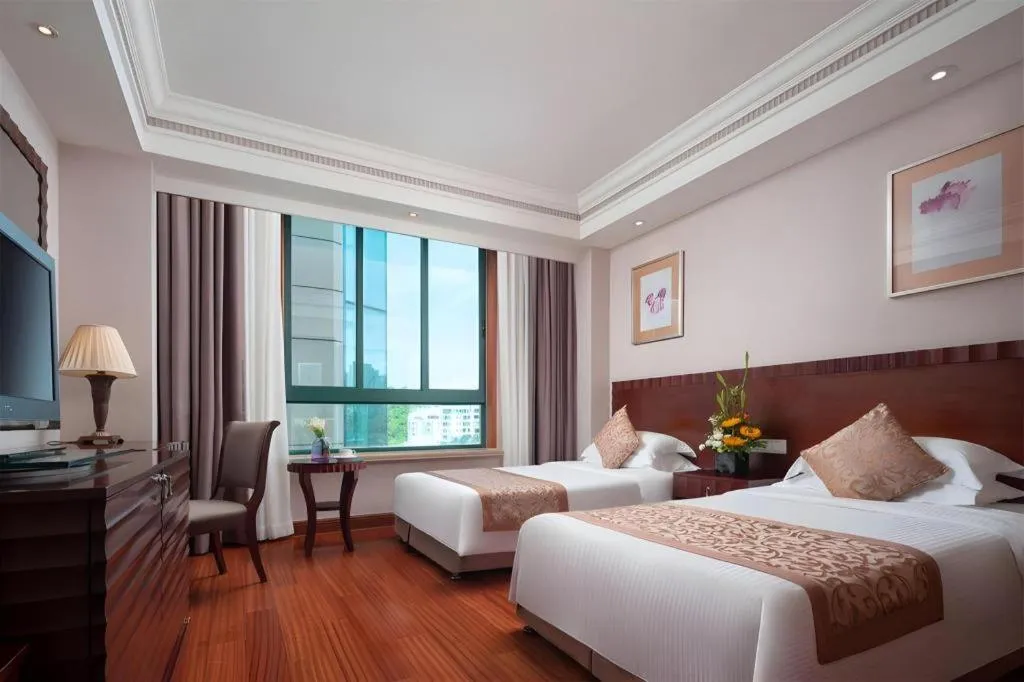 Bed in Sanya Baohong Hotel