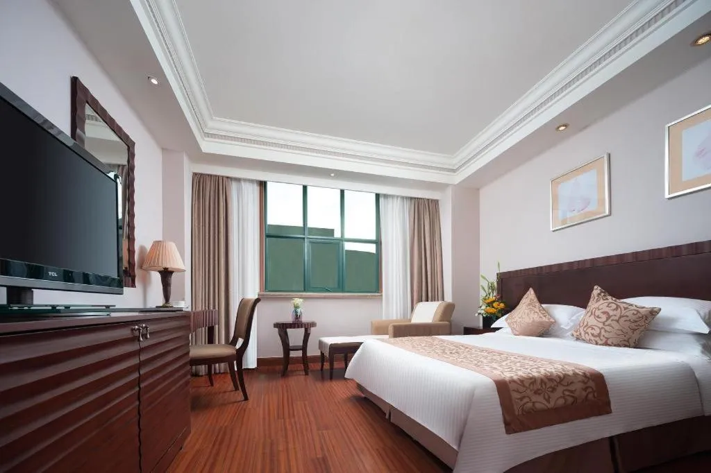 Bed in Sanya Baohong Hotel