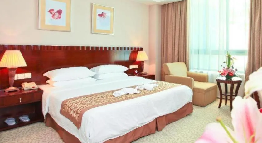 Bed in Sanya Baohong Hotel