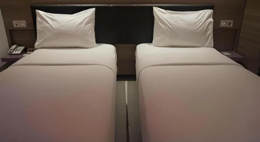 Bed in Amaris Hotel Ambon