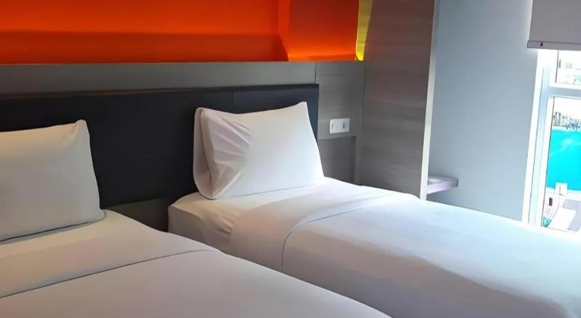 Bed in Amaris Hotel Ambon