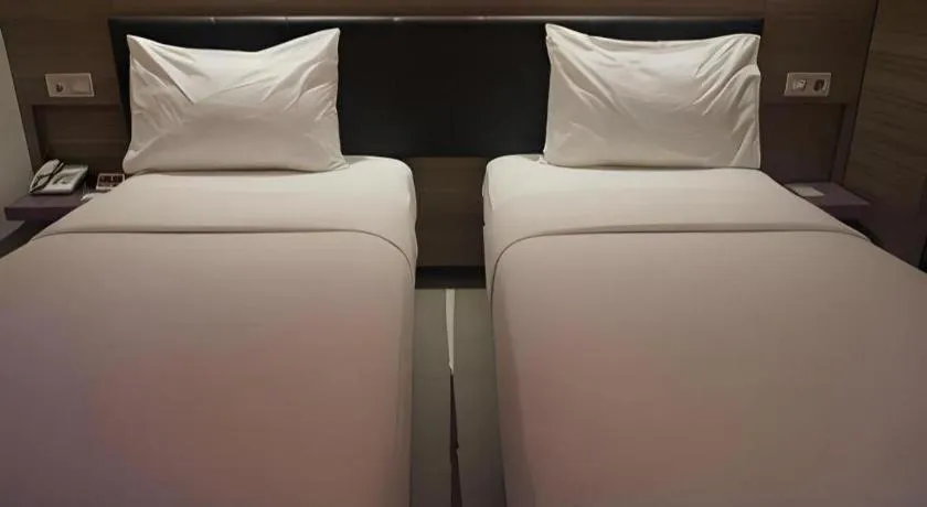 Bed in Amaris Hotel Ambon