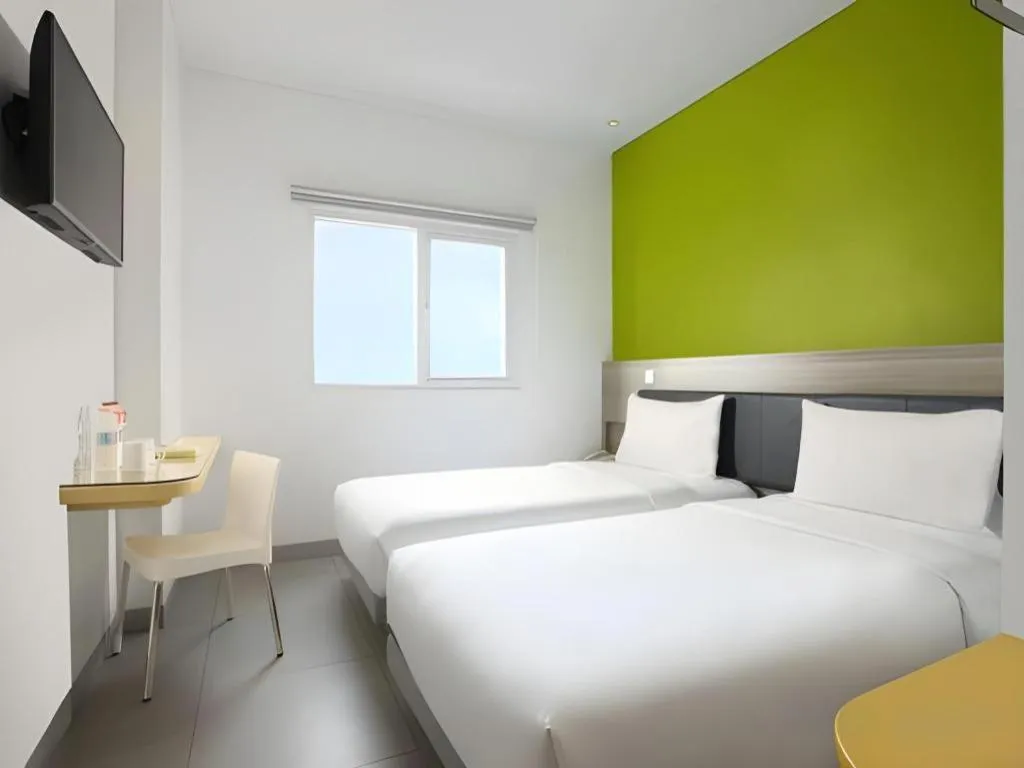 Bed in Amaris Hotel Ambon