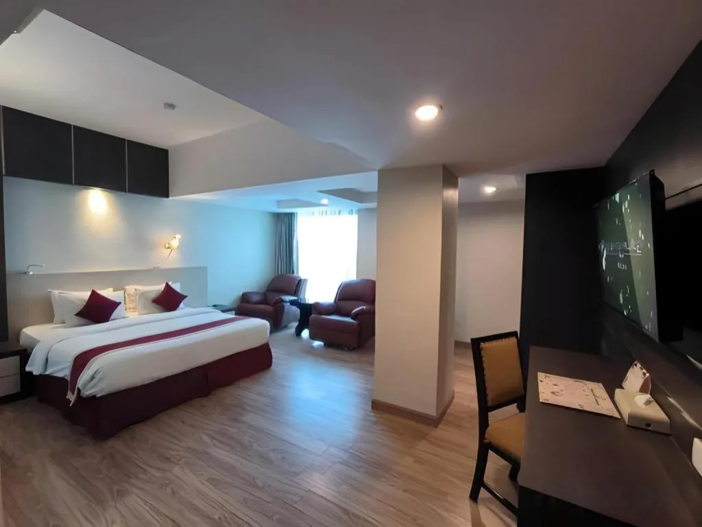 Bed in Hermes Palace Hotel Medan