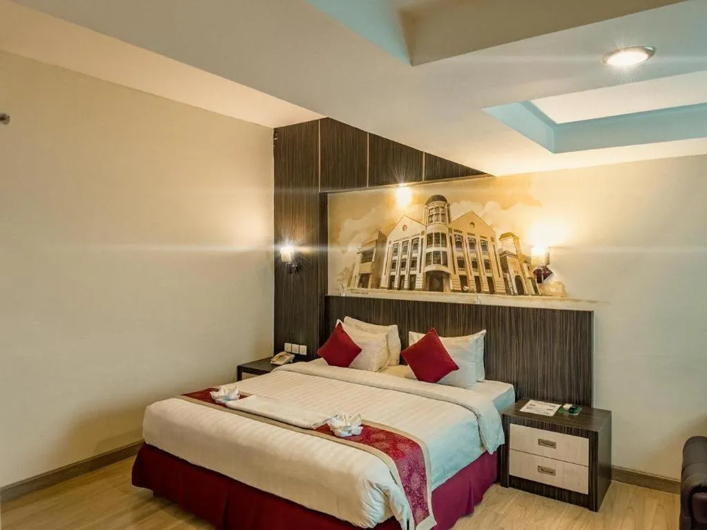 Bed in Hermes Palace Hotel Medan