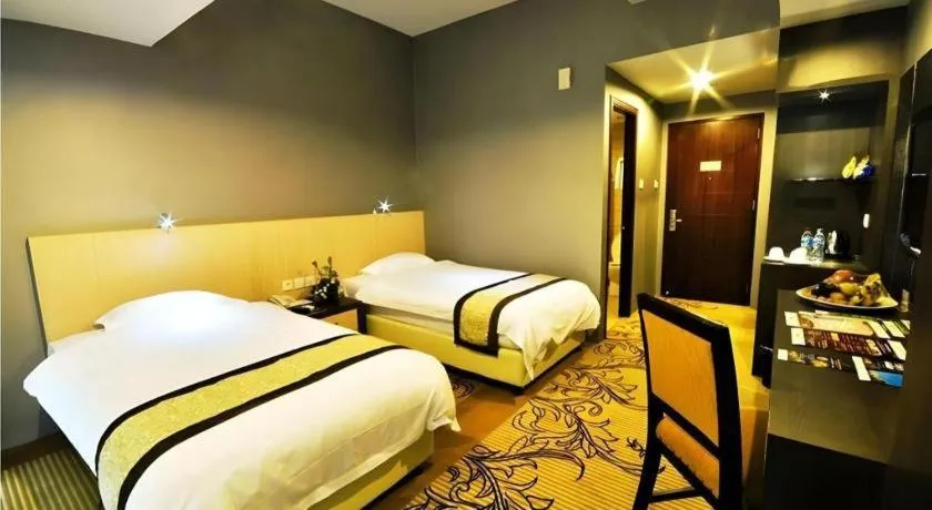 Bed in Hermes Palace Hotel Medan