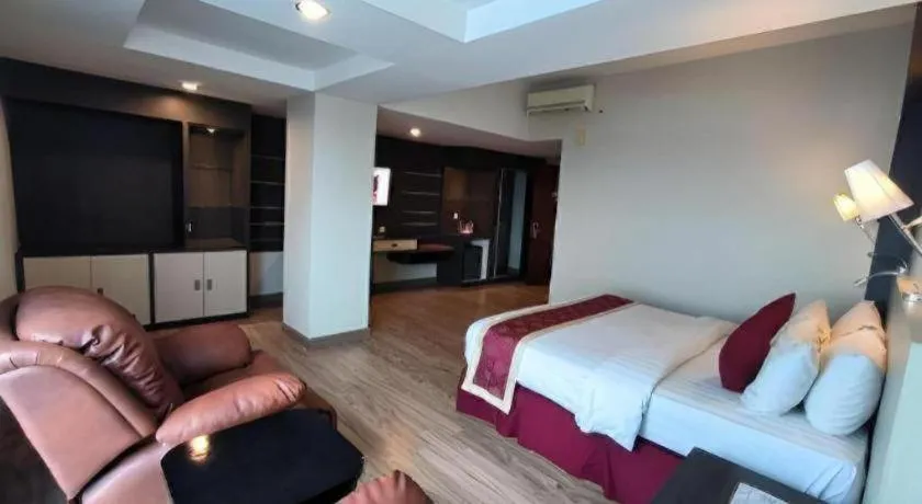 Bed in Hermes Palace Hotel Medan