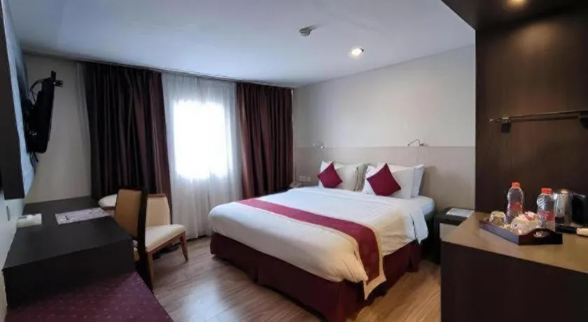 Bed in Hermes Palace Hotel Medan