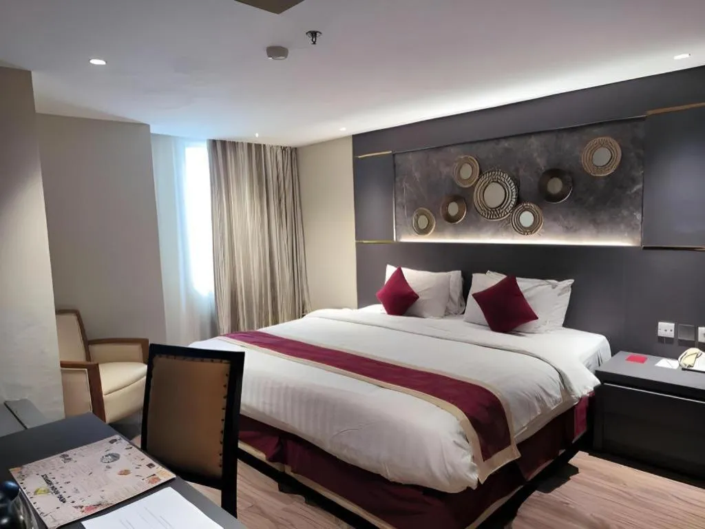 Bed in Hermes Palace Hotel Medan