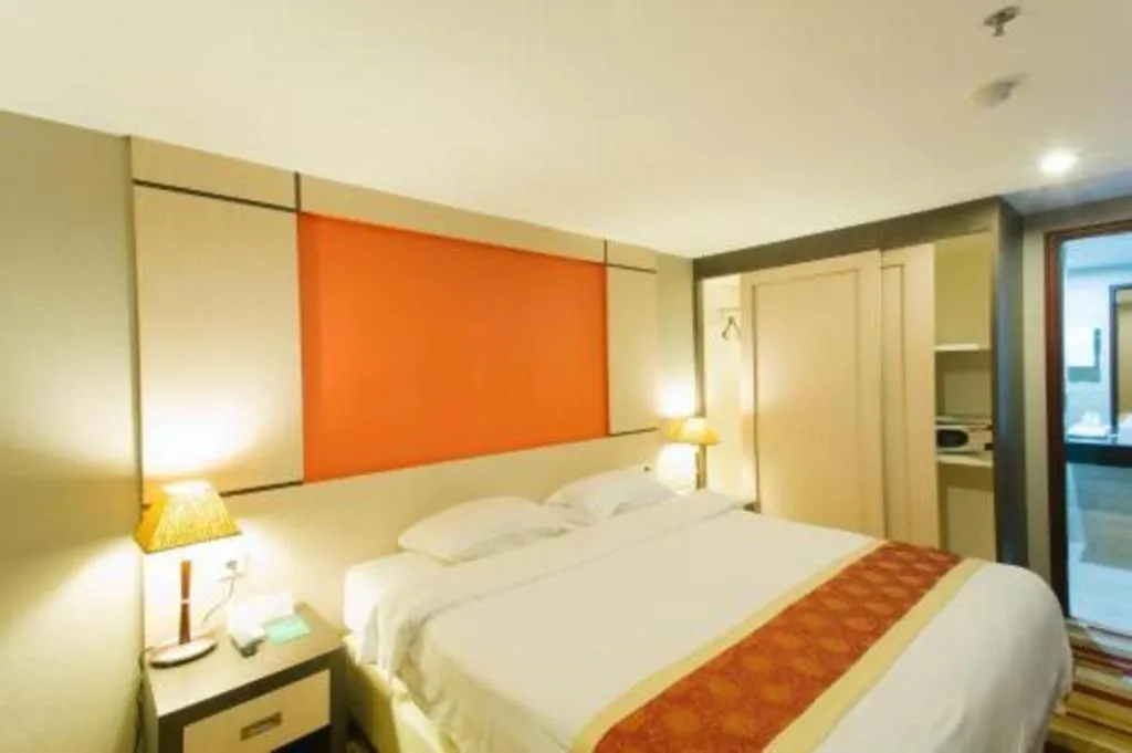 Bed in Hermes Palace Hotel Medan