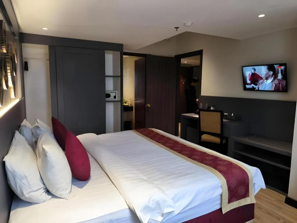 Bed in Hermes Palace Hotel Medan