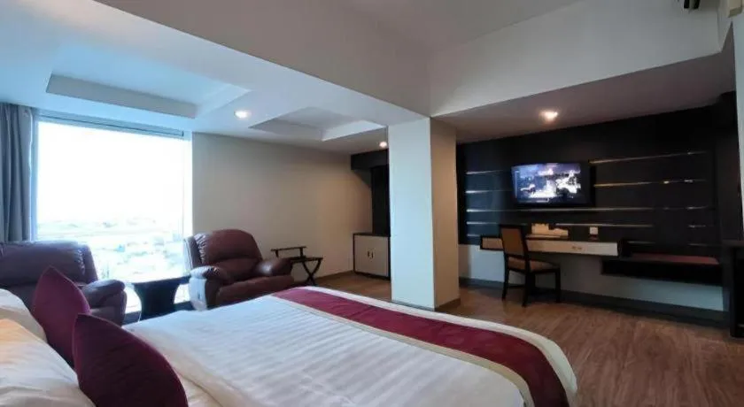 Bed in Hermes Palace Hotel Medan