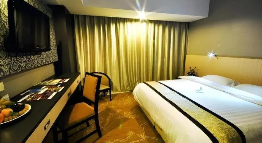 Bed in Hermes Palace Hotel Medan