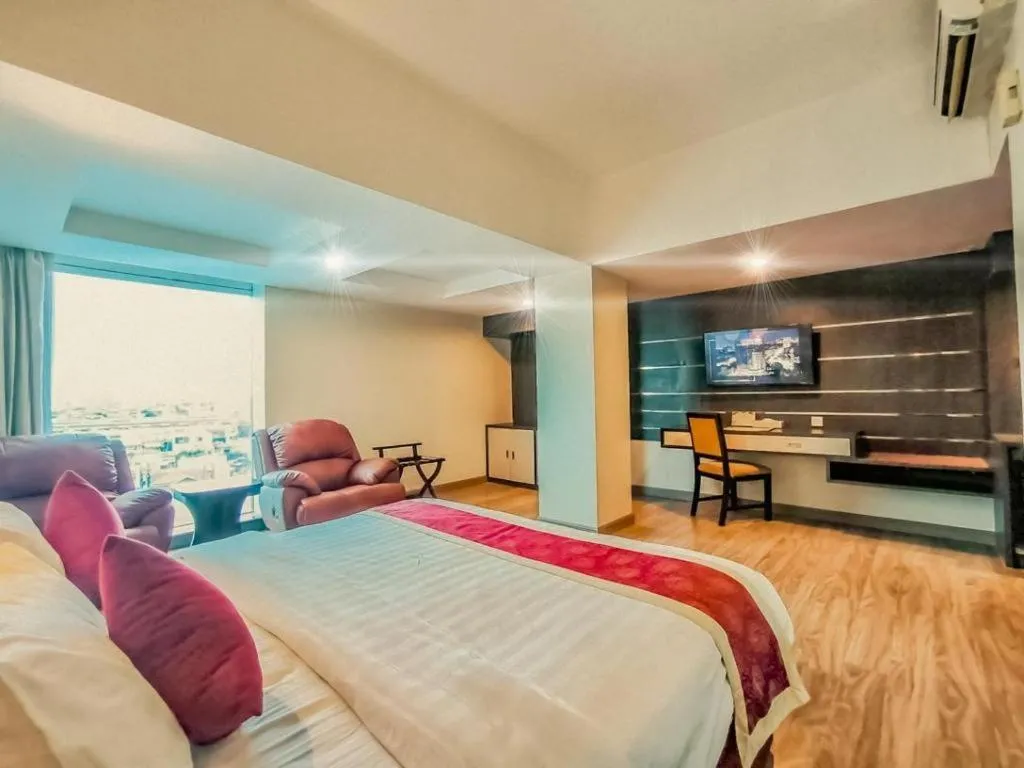 Bed in Hermes Palace Hotel Medan