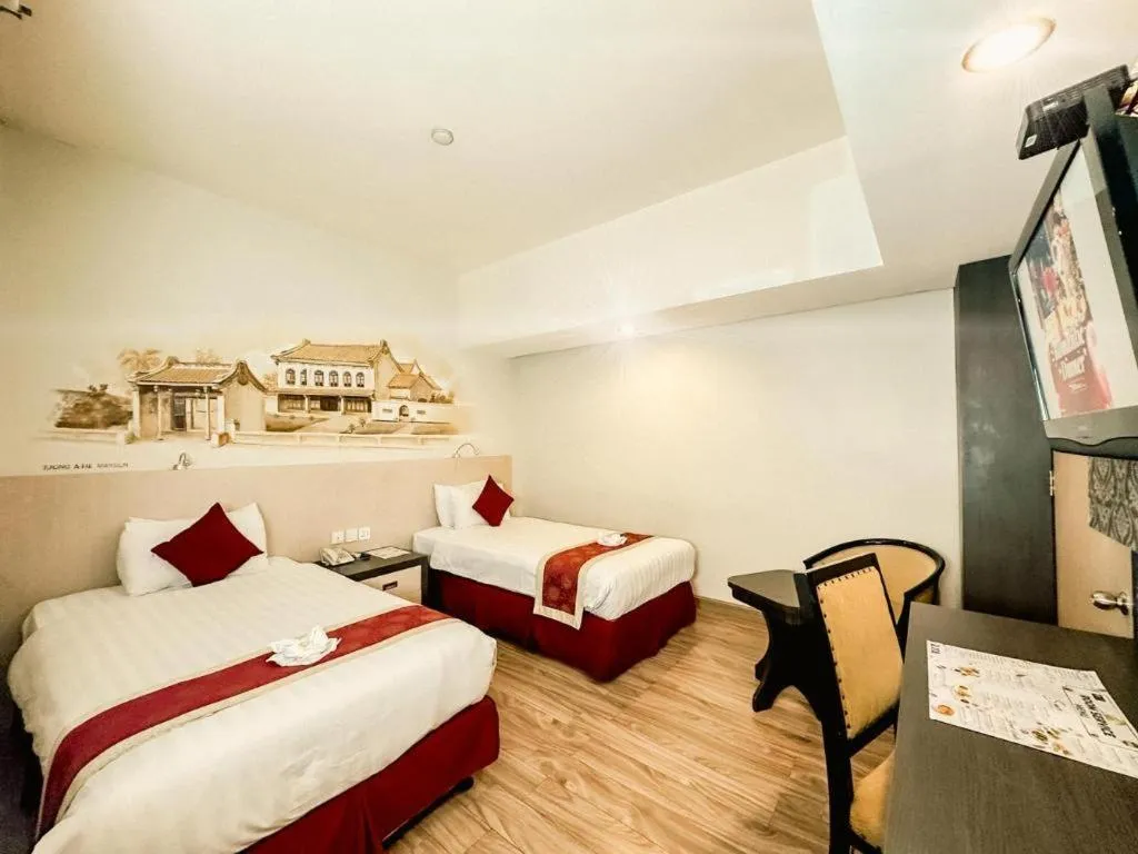 Bed in Hermes Palace Hotel Medan