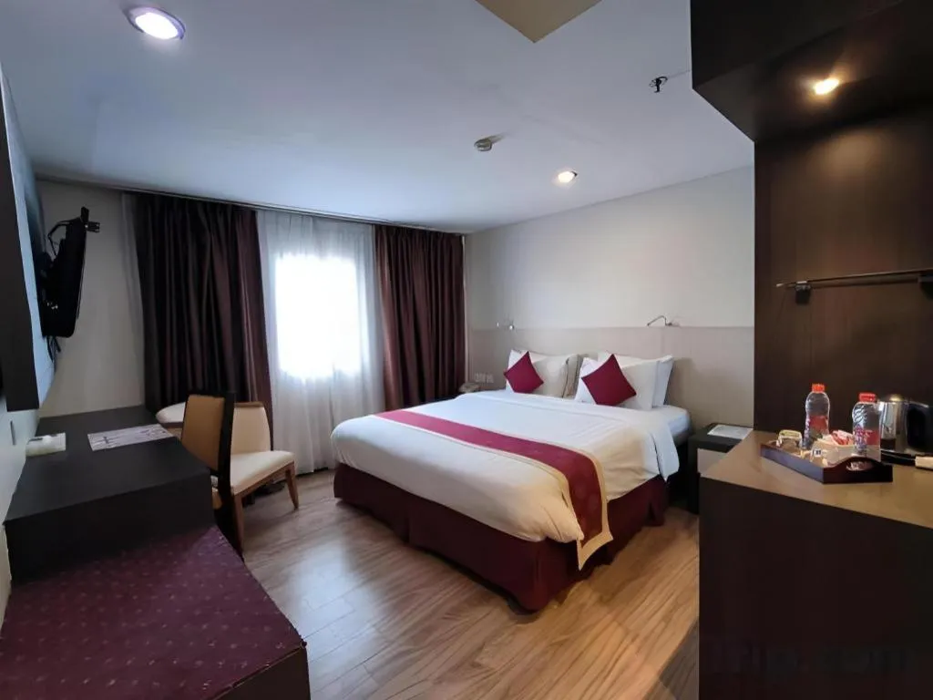 Bed in Hermes Palace Hotel Medan