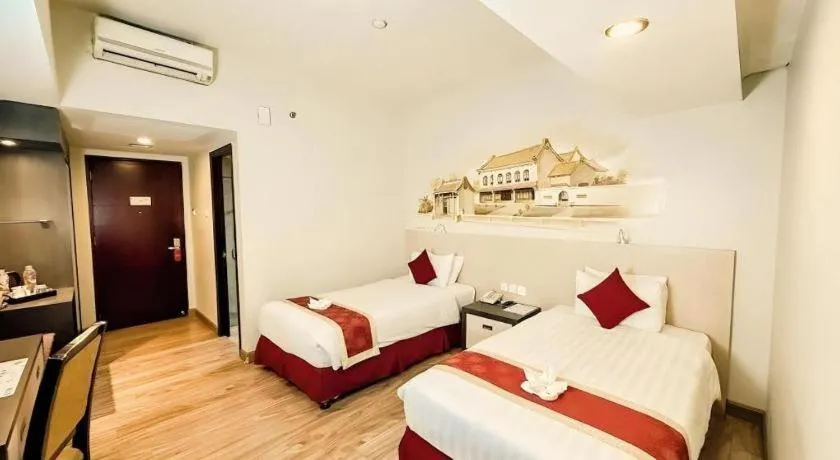 Bed in Hermes Palace Hotel Medan