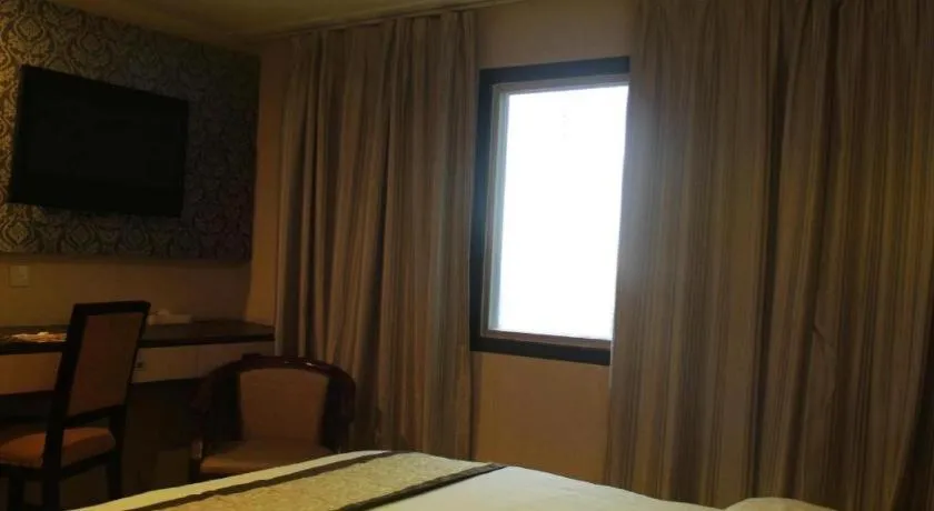 Bed in Hermes Palace Hotel Medan