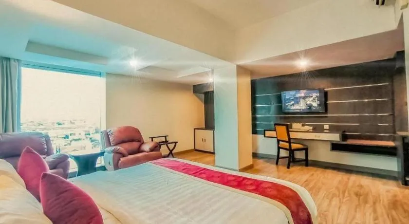 Bed in Hermes Palace Hotel Medan