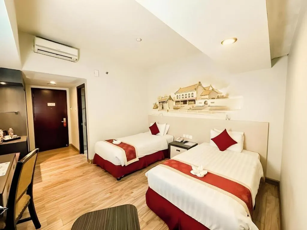 Bed in Hermes Palace Hotel Medan