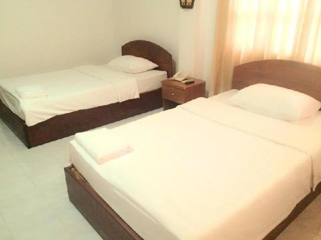Bed in Saysamphanh Hotel