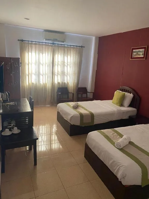 Bed in Saysamphanh Hotel