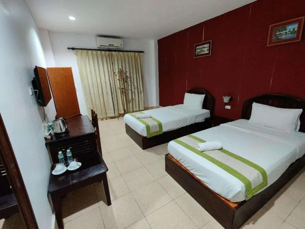 Bed in Saysamphanh Hotel