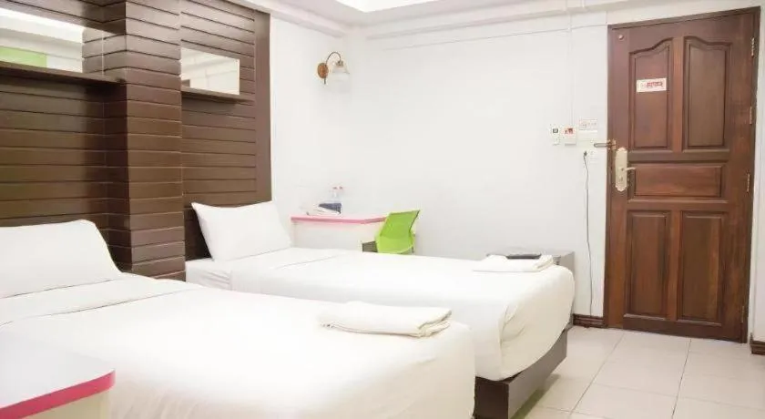 Bed in Huay Kaew Palace 1 Hotel