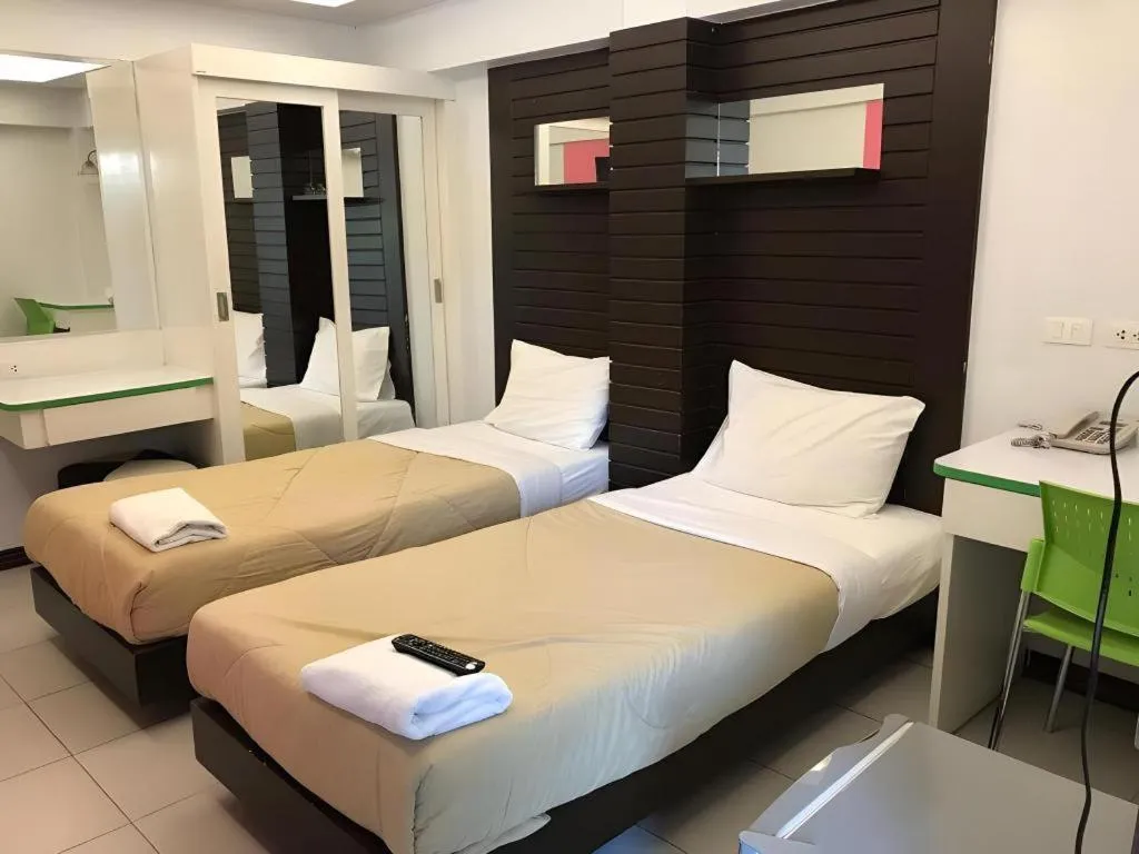 Bed in Huay Kaew Palace 1 Hotel