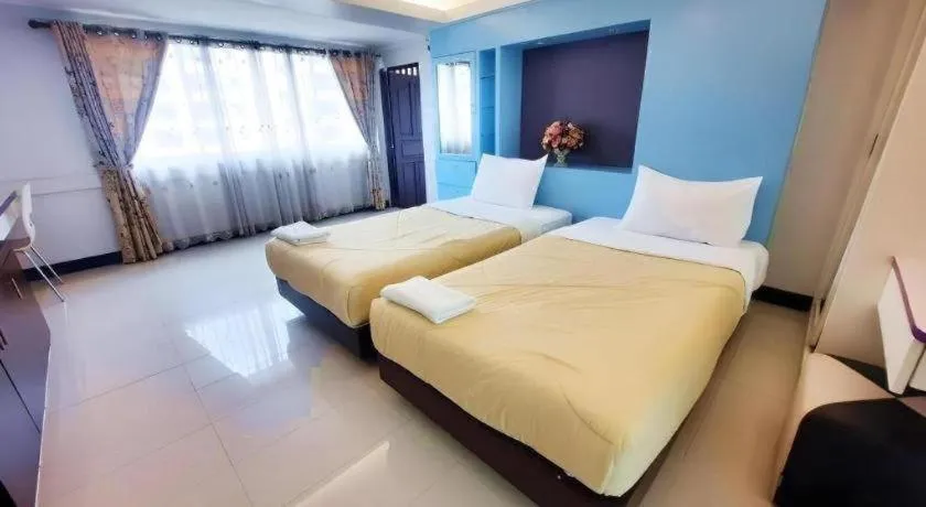 Bed in Huay Kaew Palace 1 Hotel