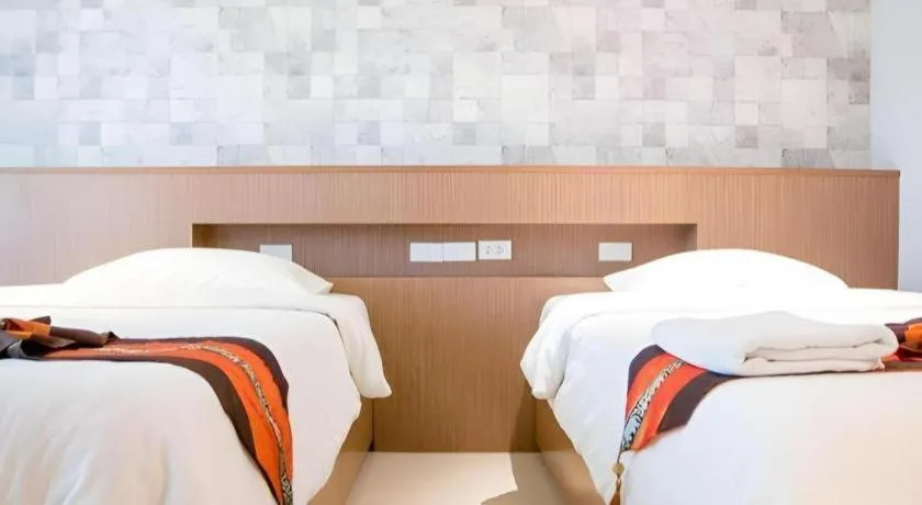 Bed in Huay Kaew Palace 1 Hotel